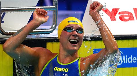 Swedish swimmer Sarah Sjoestroem breaks her own world record in the 50-meter freestyle